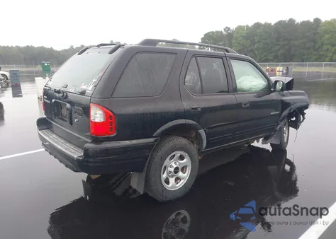 2003 Isuzu Rodeo S 3.2L V6 z USA, uszkodzony, nr VIN 4S2CK58WX34301017